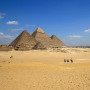 egypt giza pyramids camels tourists 