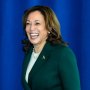 Kamala Harris smiles as she is introduced at an event 