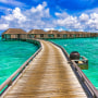 A little island resort in the South Male Atoll with exotic beaches, over water villas, clear and turquoise water.