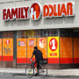 A cyclist rides past a Family Dollar store in Chicago