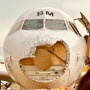 An Austrian Airlines airplane’s nose and cockpit windows were severely damaged by hail during a flight from Spain to Austria after encountering a thunderstorm cell, officials say.