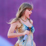 Taylor Swift stops mid-song to help a fan in distress at Edinburgh Eras tour show.