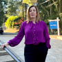 Rana Robillard, an Oakland-based tech executive, in front of the home in Orinda, Calif., that she attempted to purchase earlier this year.