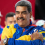 Venezuelan President Nicolas Maduro celebrates after winning the presidential election at Miraflores Palace July 28, 2024 in Caracas.