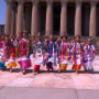 Members of the Nashville community perform a traditional blessing for the collection of artifacts outside The Parthenon.