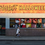 A person walks past A Spirit Halloween location