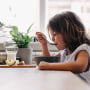Girl eating breakfast