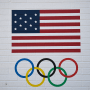 USOC logo showing a U.S. flag and the Olympic ring.
