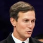 Jared Kushner points while standing