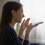 Woman speaking into phone