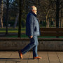 A senior man walking in the park