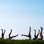 Yoga students point their toes skyward during a weekly session at Kettle Cove. The donation-based classes are held on Fridays at 8 a.m. The donations are split between Kettle Cove State Park and South Portland-based nonprofit group Cultivating Balance, teacher Melora Gregory said.
