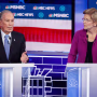 Image: Democratic presidential candidate, former New York City Mayor Mike Bloomberg speaks as Sen. Elizabeth Warren, D-Mass., looks on during a Democratic presidential primary debate