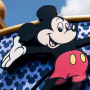 A Mickey Mouse sign showing Mickey smiling with his arms outstretched