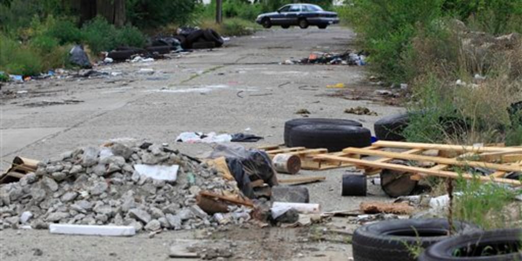 Vacant Detroit becomes dumping ground for the dead