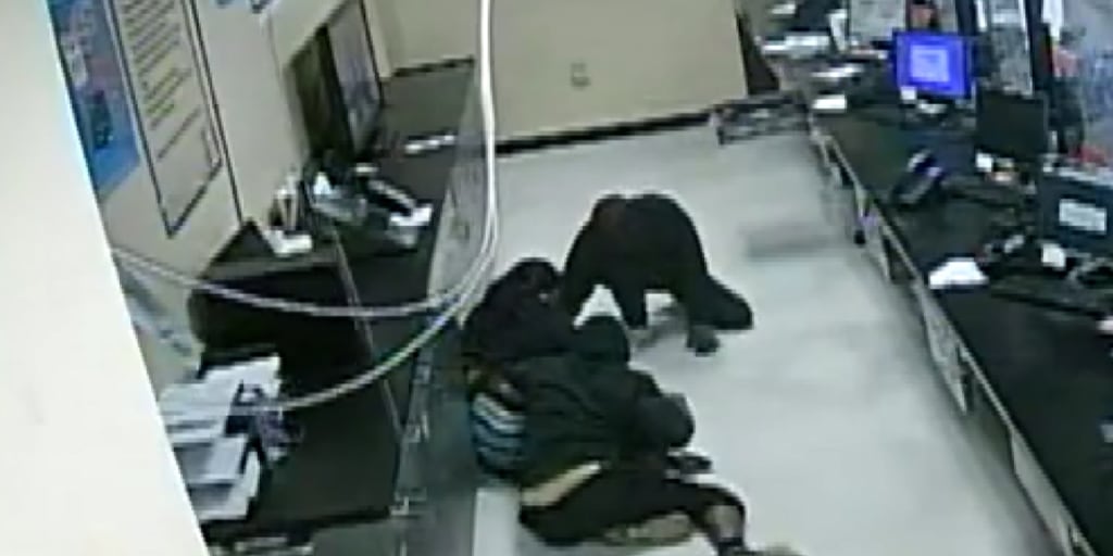 Video shows robbers in Atlanta falling through ceiling of cash-checking business