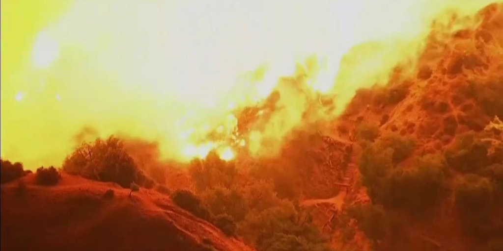 New wildfire burns in Hollywood Hills near Runyon Canyon