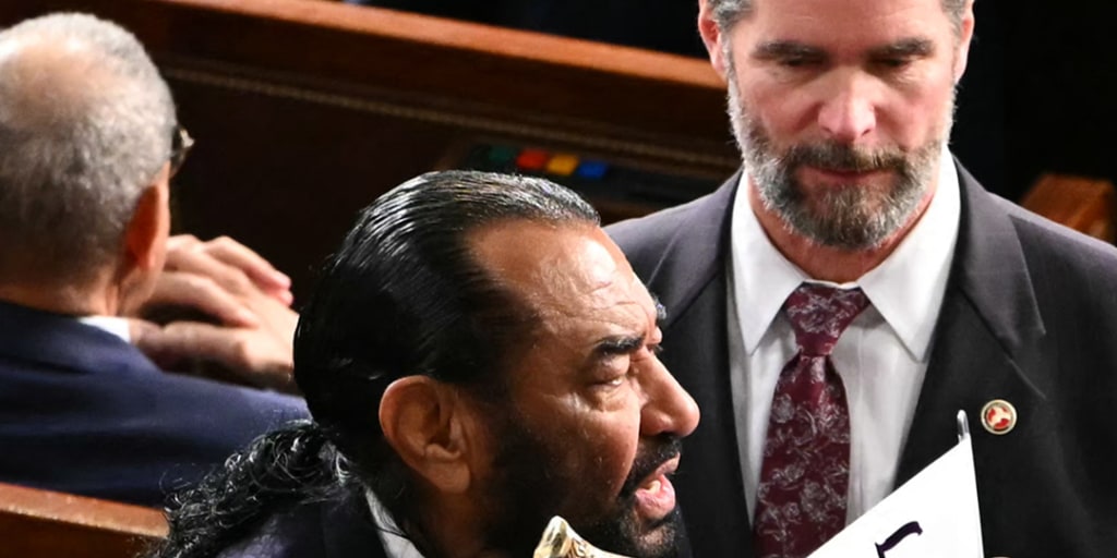 Rep. Al Green explains 'Black people aren't apes' sign