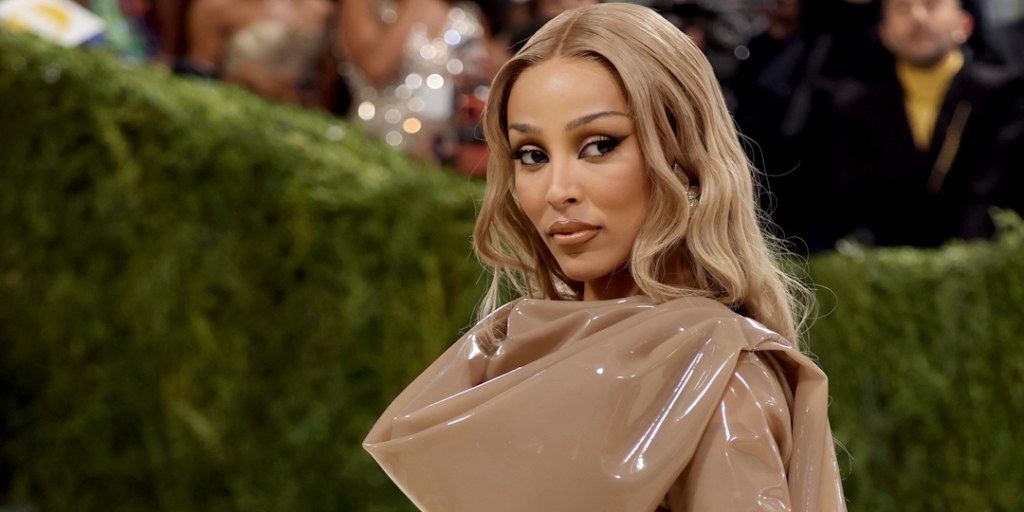 Doja Cat arrives in silicone Saint Laurent dress