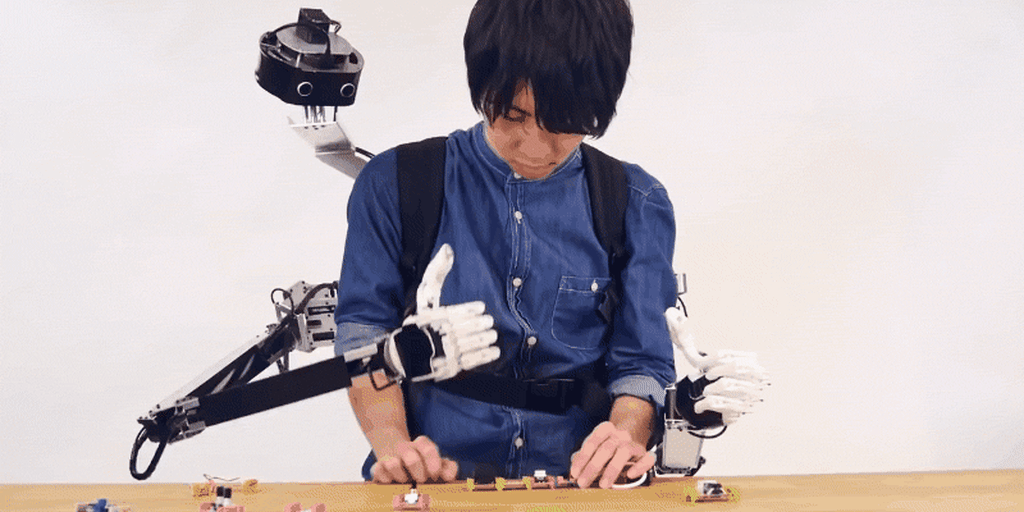 Robotic head and arms let two people share one