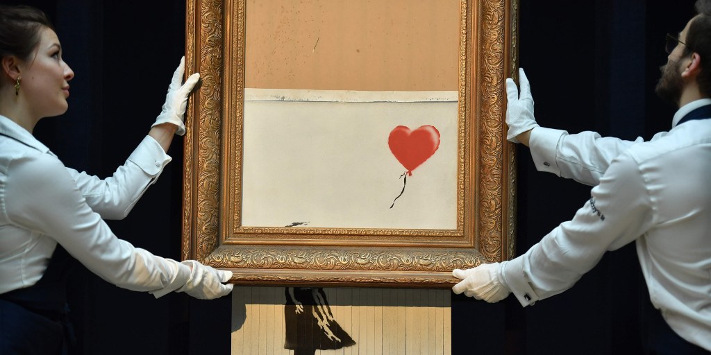 Banksy s shredded painting stunt was viral performance art. But