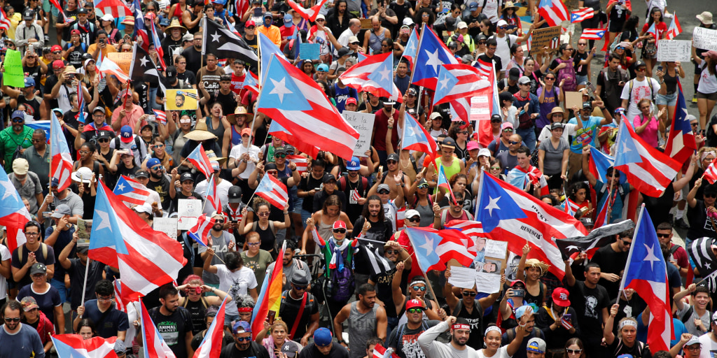 https://media-cldnry.s-nbcnews.com/image/upload/t_nbcnews-fp-1024-512,f_auto,q_auto:best/newscms/2020_44/3407058/200824-puerto-rico-rally-flags-jm-1502.jpg