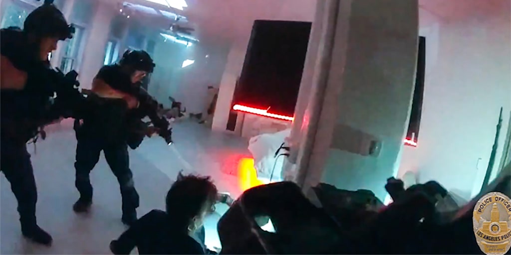 Dramatic video shows SWAT team rescue woman in downtown L.A. hostage  situation