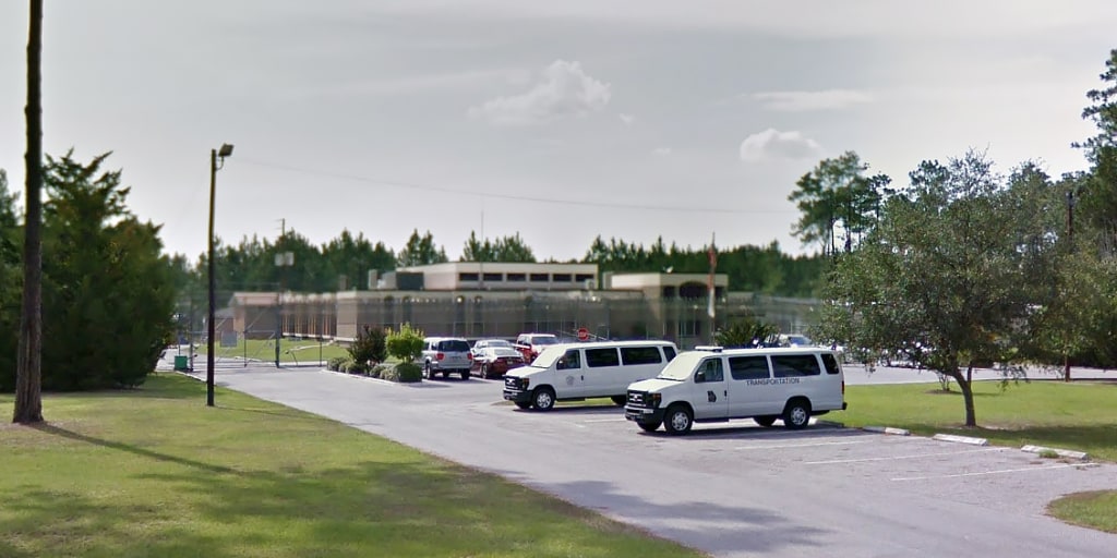 Ex-officer arrested after child dies following 'fight game