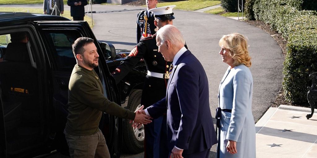 221221-BidenZelenskyy-handshake-suv-ac-6