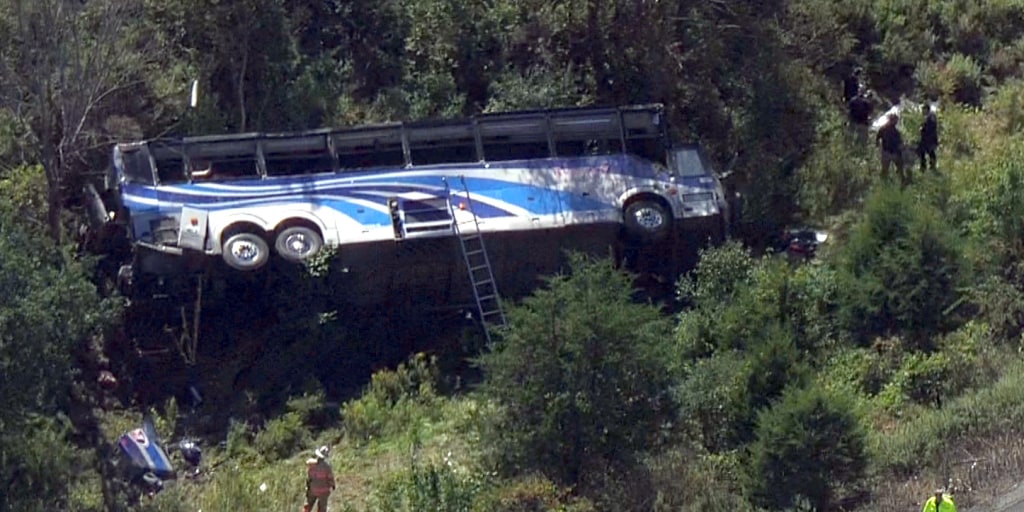 Two dead over 40 injured in rollover crash of bus carrying