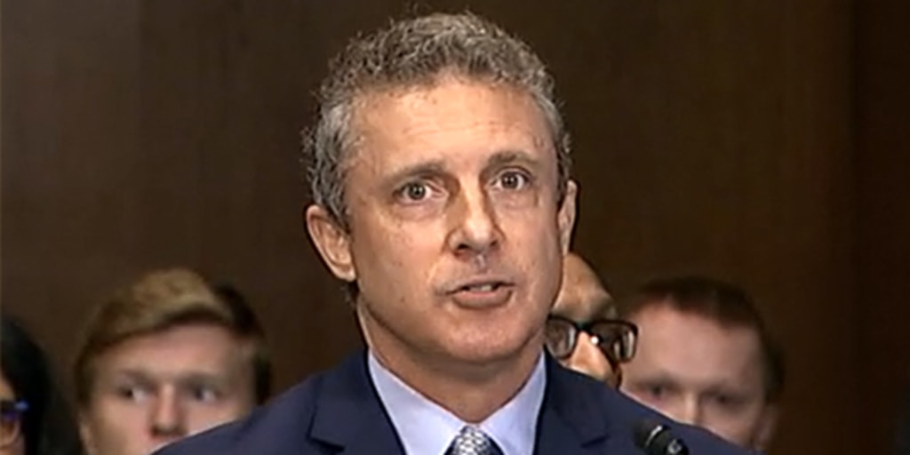 Judge temporarily reinstates fired ethics watchdog