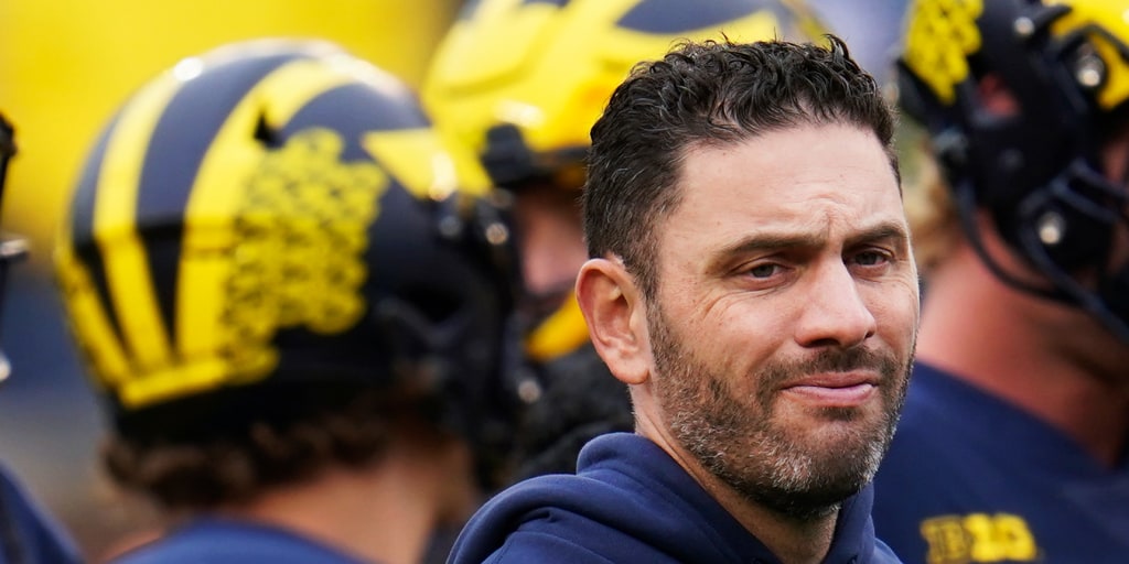 Ex-Michigan football coach allegedly stole intimate photos from over 3,000 student accounts, feds say
