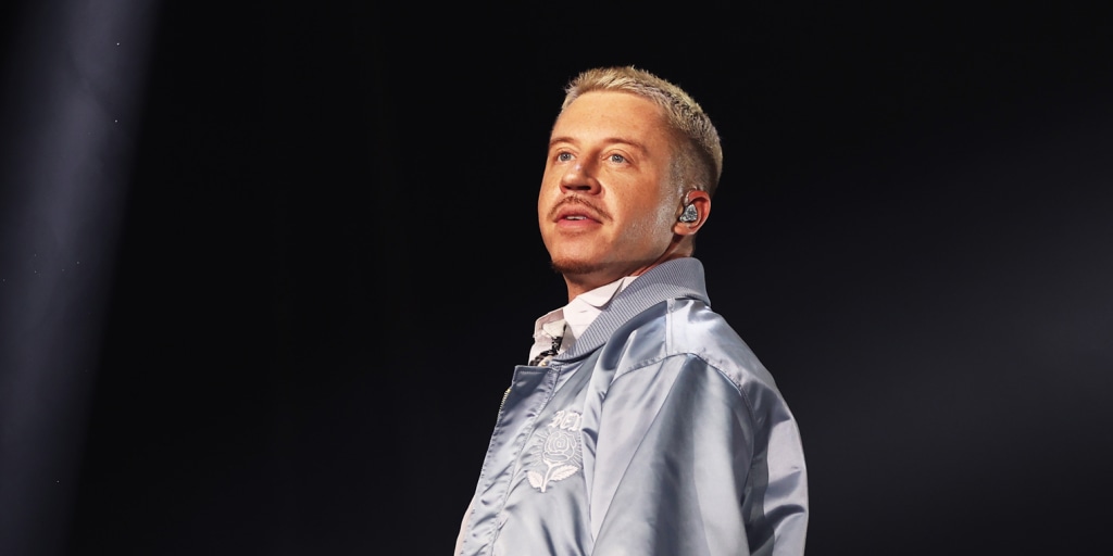 Macklemore is donating $1 million of his earnings to Palestinian relief organizations after he was removed from Ed Sheeran’s tour, and he has invited New England Patriots owner Robert Kraft to do the same.