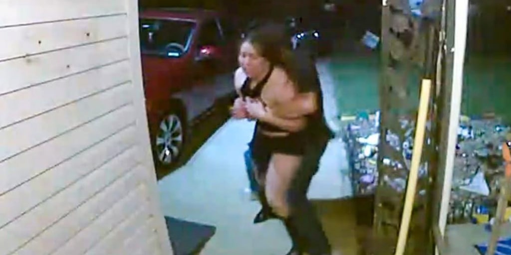 Police release chilling video of unknown woman being 'abducted' as mystery surrounds what happened