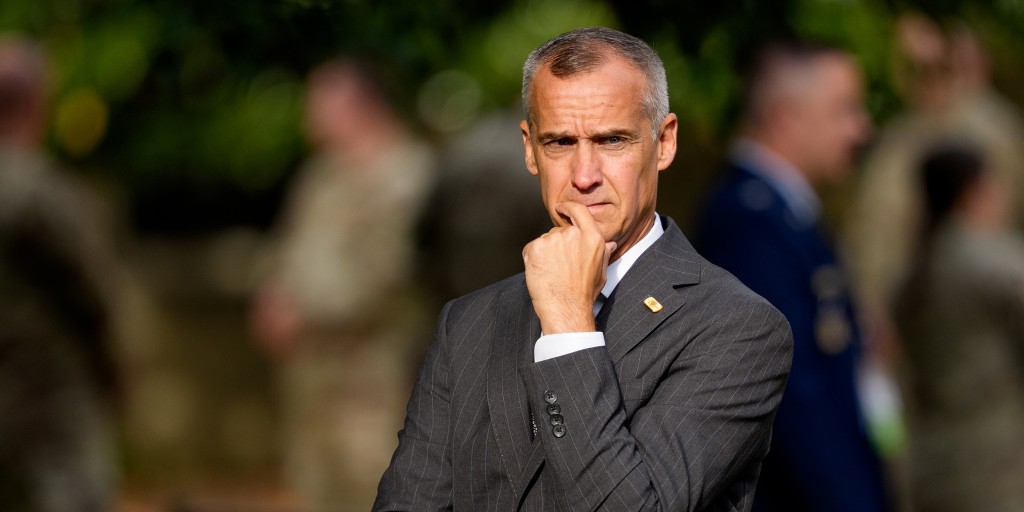 Kristi Noem and Corey Lewandowski, photographed mid–nationwide deportation scheme, presumably pausing between discussions of "border security" and who gets the next kickback.