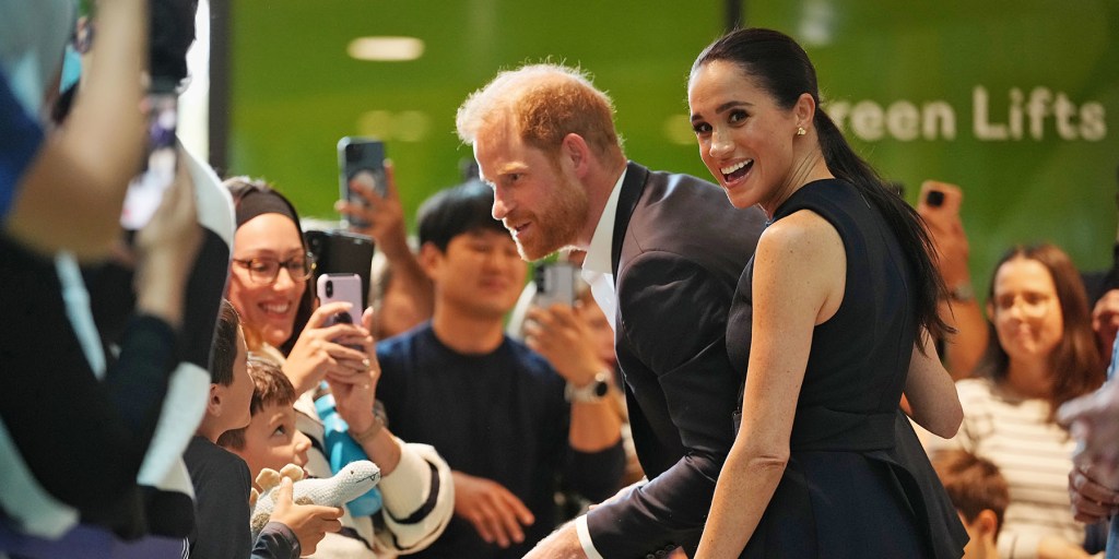 Prince Harry and Meghan arrive in Australia to a muted welcome