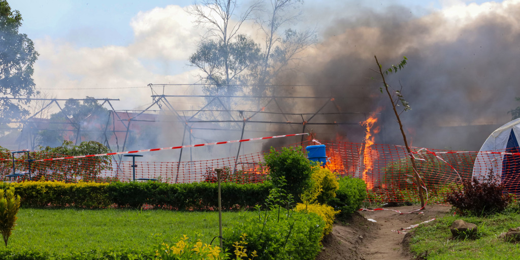 Residents burn an Ebola treatment center in DR Congo as anger grows over the outbreak