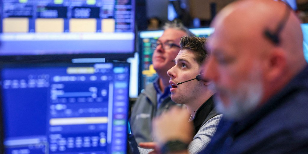 Stocks sink as interest rate hike odds rattle tech
