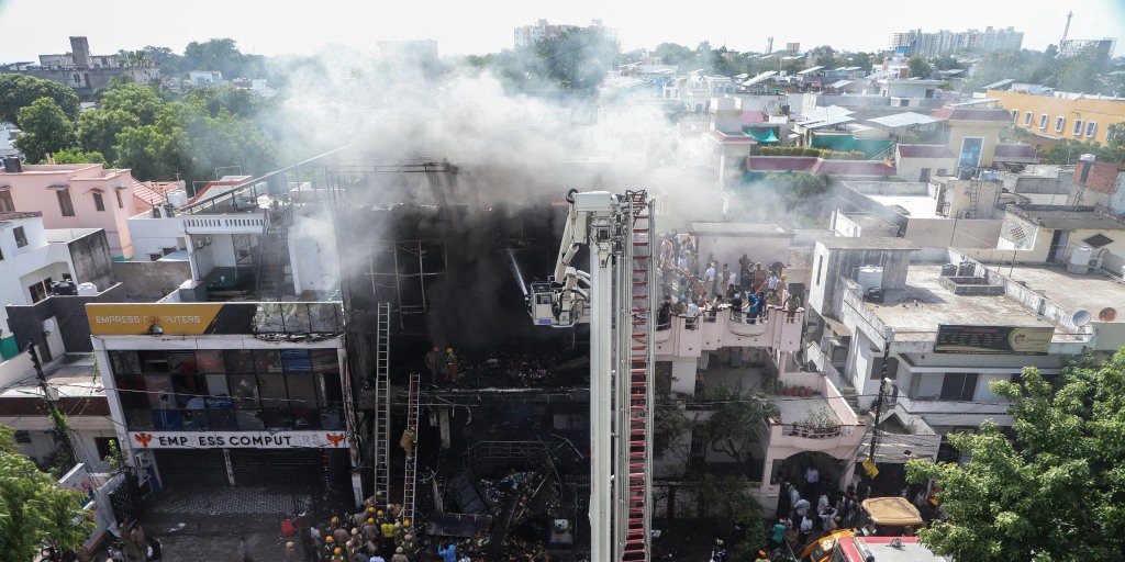 Fire tears through building in northern India, killing 14, mostly students