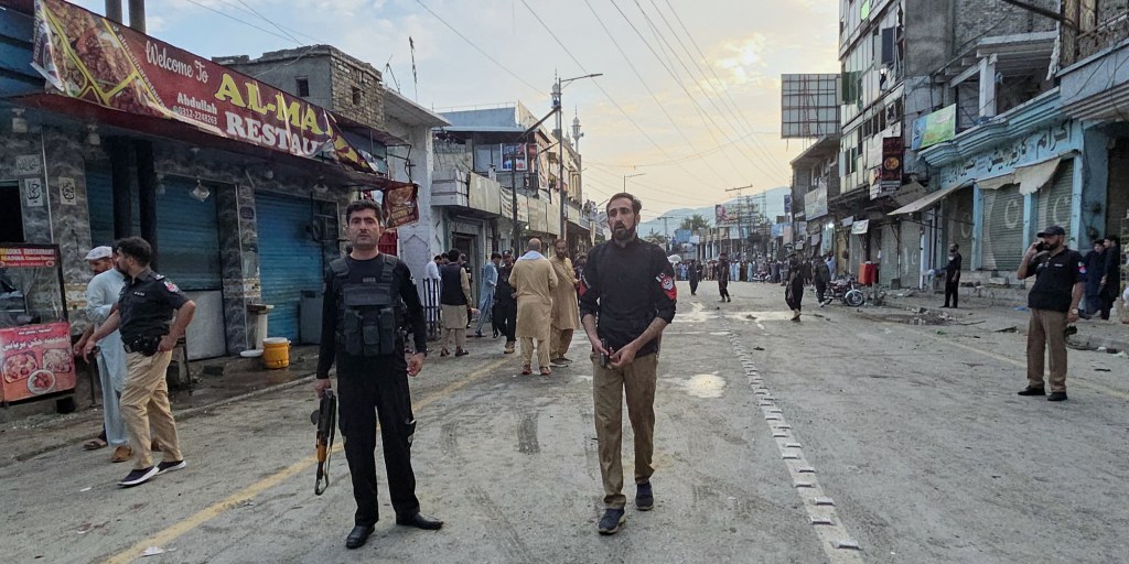 A suicide bomber targets protesters at an antimilitant rally in northwestern Pakistan, killing at least 14 people, mostly civilians and police officers, and wou