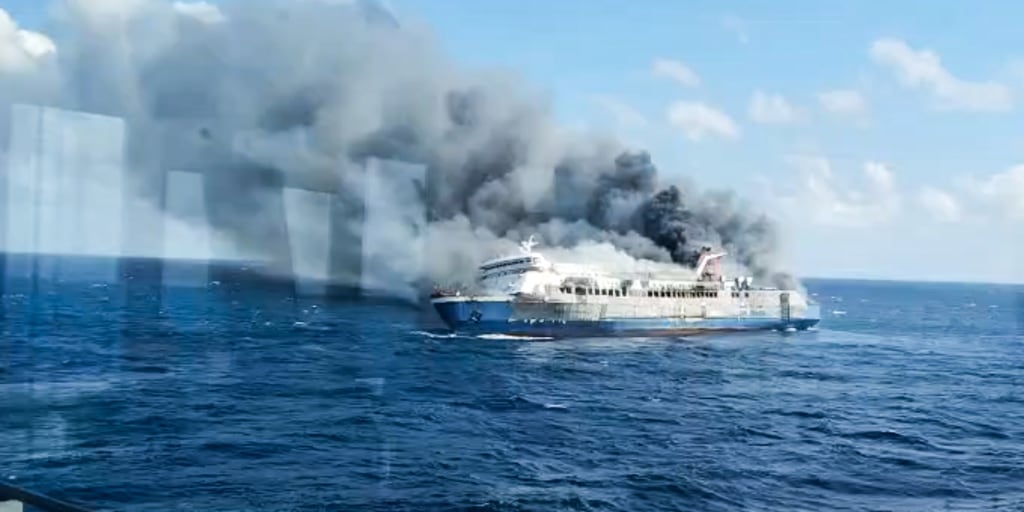 An Indonesian ferry carrying 271 people caught fire in waters off the main island of Java, leaving at least five people dead and dozens missing as rescuers and 