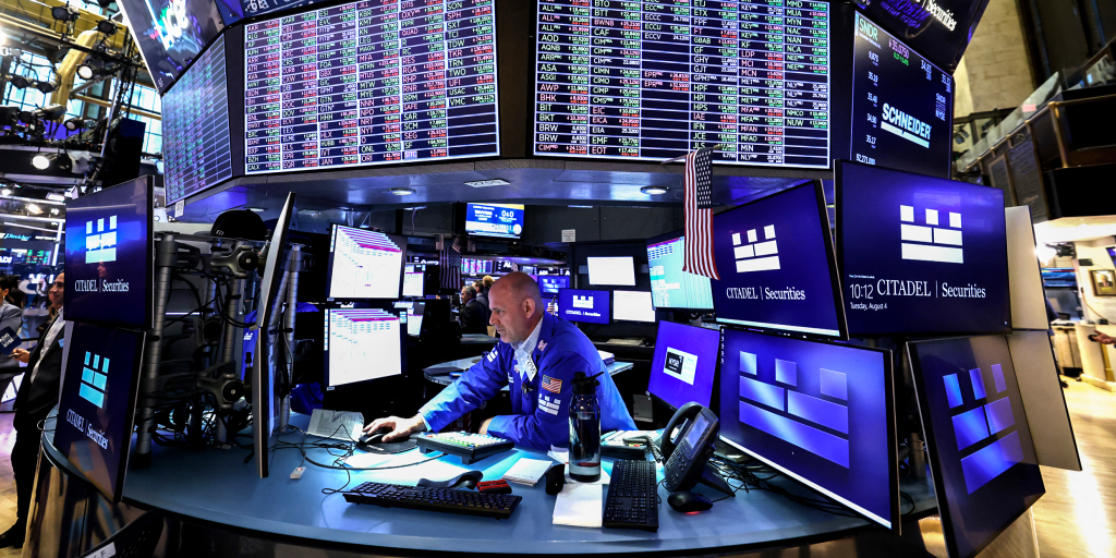 Dow hit record highs on strong AI-linked earnings and hopes for an Iran war deal