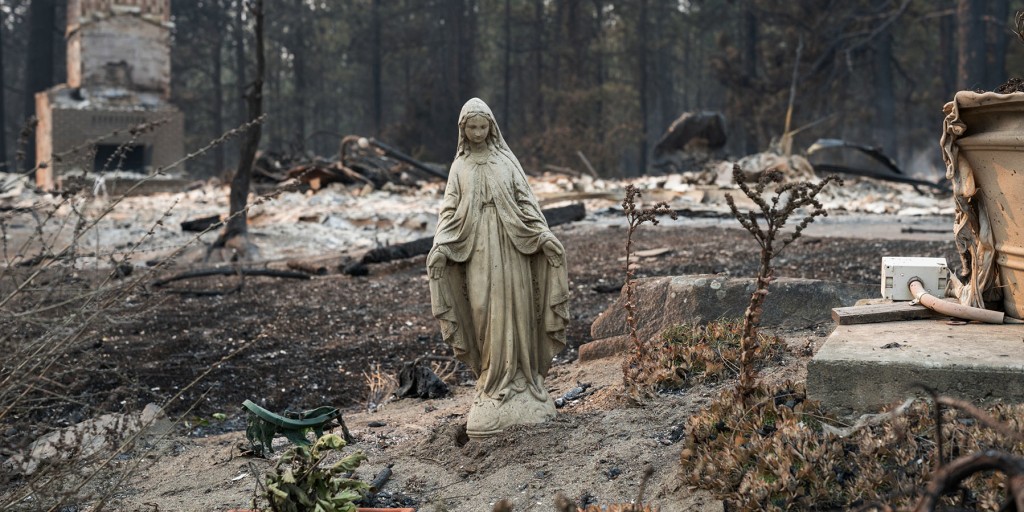 The man accused of starting the largest of three wildfires in Spokane previously pleaded guilty to manslaughter in the killing of his father, according to court