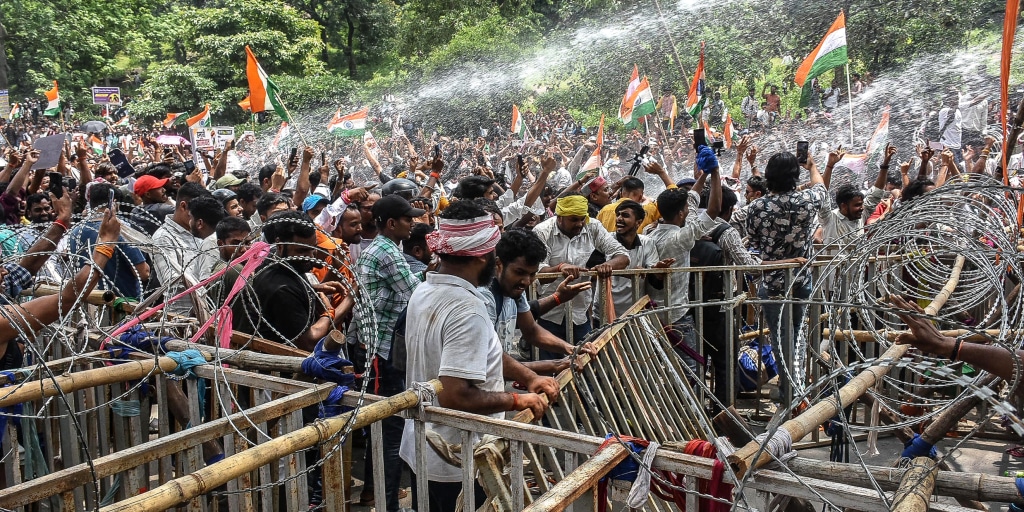 Indian police use tear gas and batons to disperse youth protest over exam paper leaks