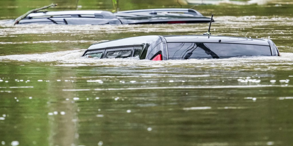 At least 6 people have died from days of storms and record-setting flooding in Indiana