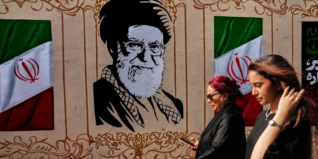Iran vows 'devastating' response as U.S. threatens toughest ever economic hit