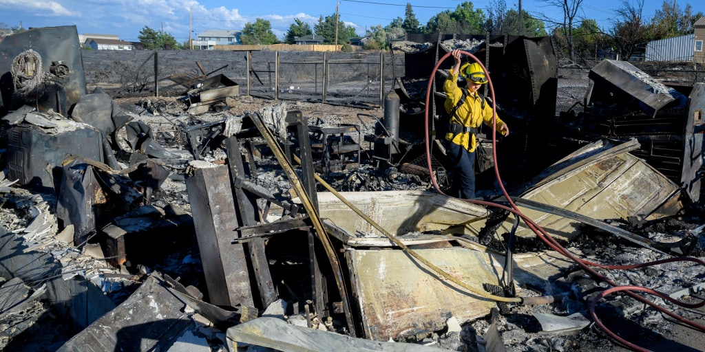 Around 9,000 people have been cleared to return to their Reno, Nevada, area homes as firefighters make more progress containing a major, human-caused wildfire t