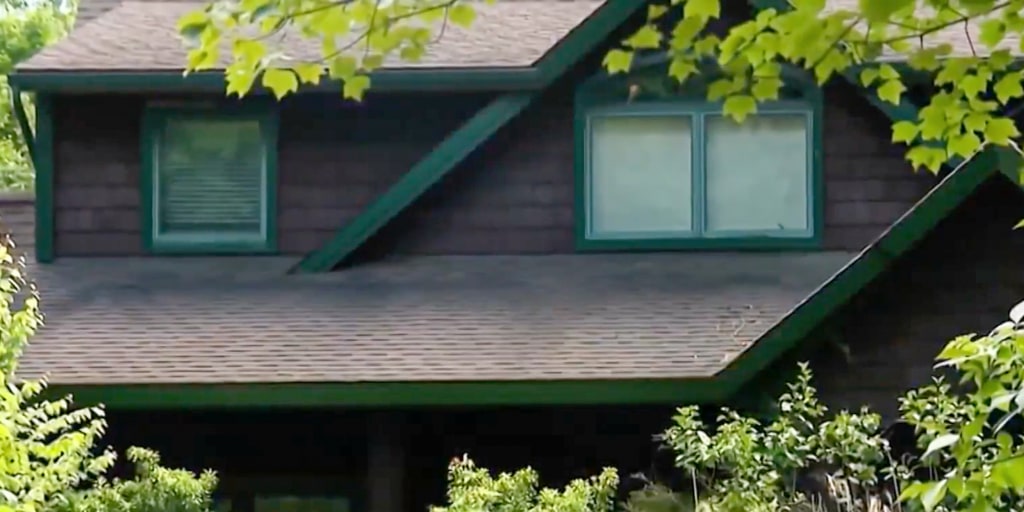Newly released court documents are providing more details about what investigators found inside a Burlington home where the skeletal remains of three people wer