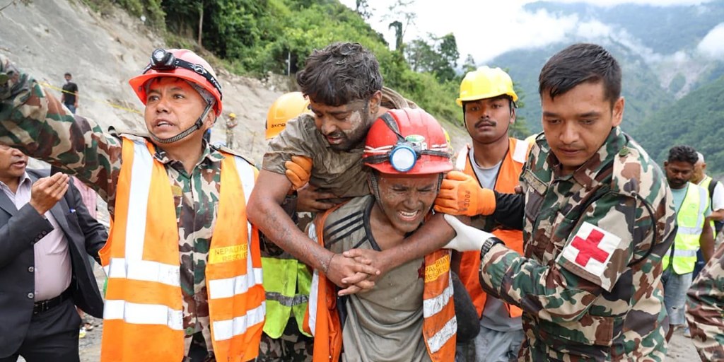 NEW: Dramatic images show the moment two workers are pulled out alive from a hydropower tunnel in Nepal, nine days after a deadly flood.