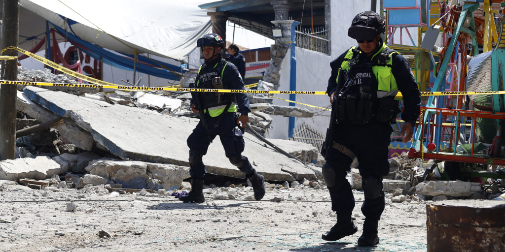 Pyrotechnic material explodes during the festival for a patron saint in a town in Mexico State, collapsing a wall, killing at least 10 people and injuring 64 more, Mexican authorities say.